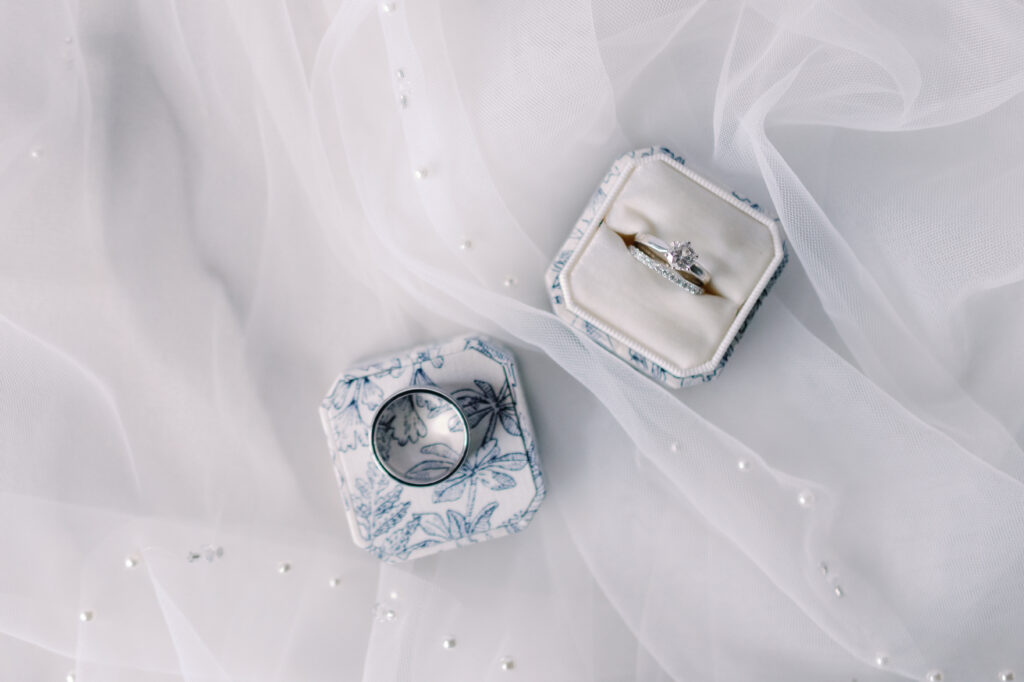 Wedding day details, styled with the brides veil, couples rings and a curated ring box from the MFP Wedding Story Design Collection. Ring box The Mrs. Box, The Balboa Single Ring Box.
